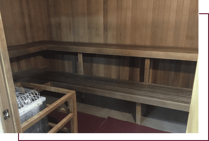 A room with wooden shelves and a table